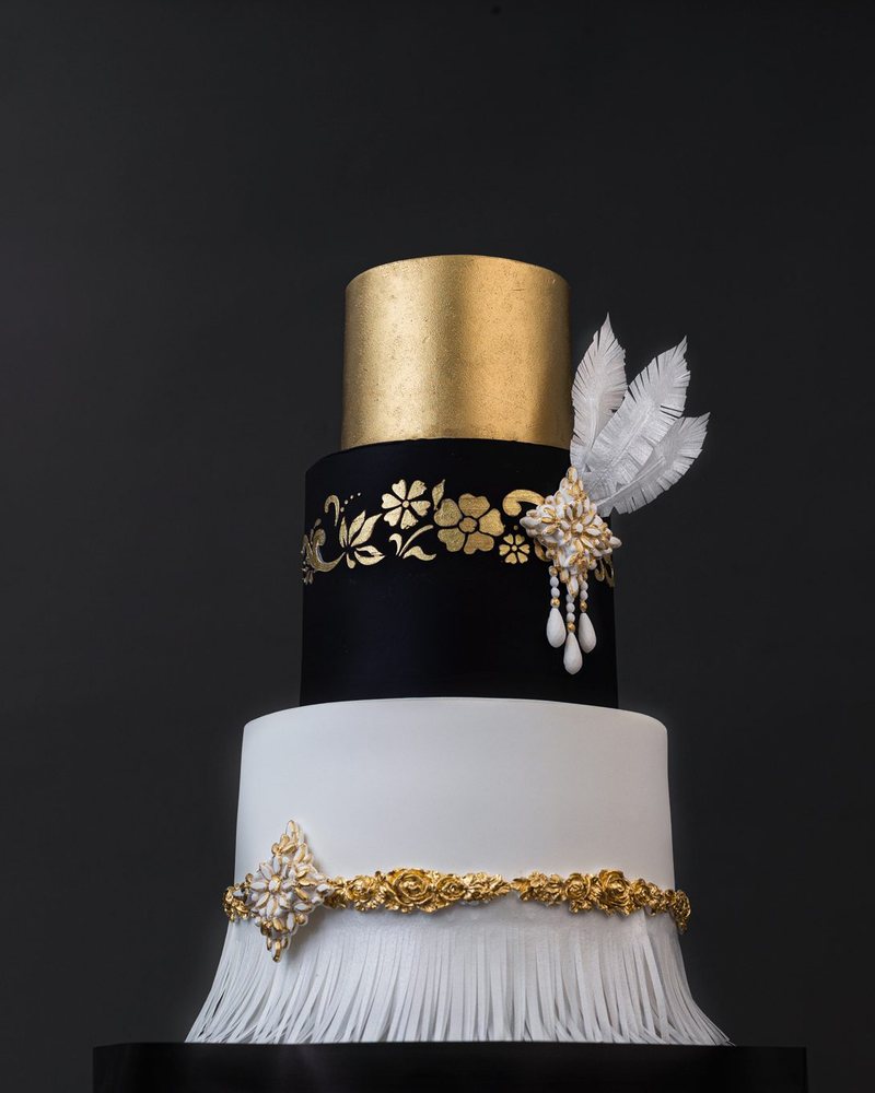 Black and gold couture cake